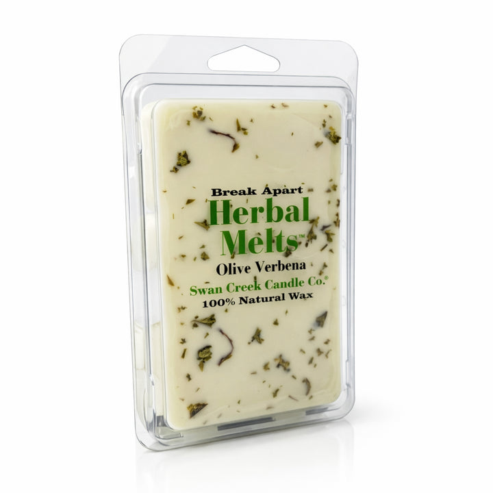 Herbal wax melt package with visible herbs on a white background