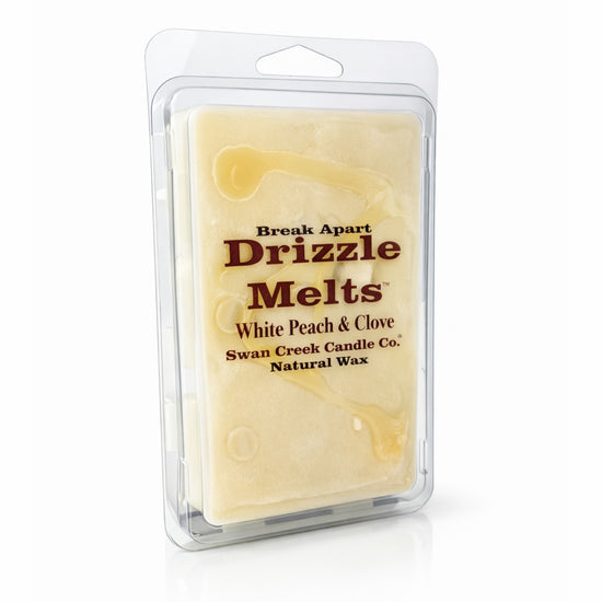 Packaged wax melt with 'Drizzle Melts' branding on a white background
