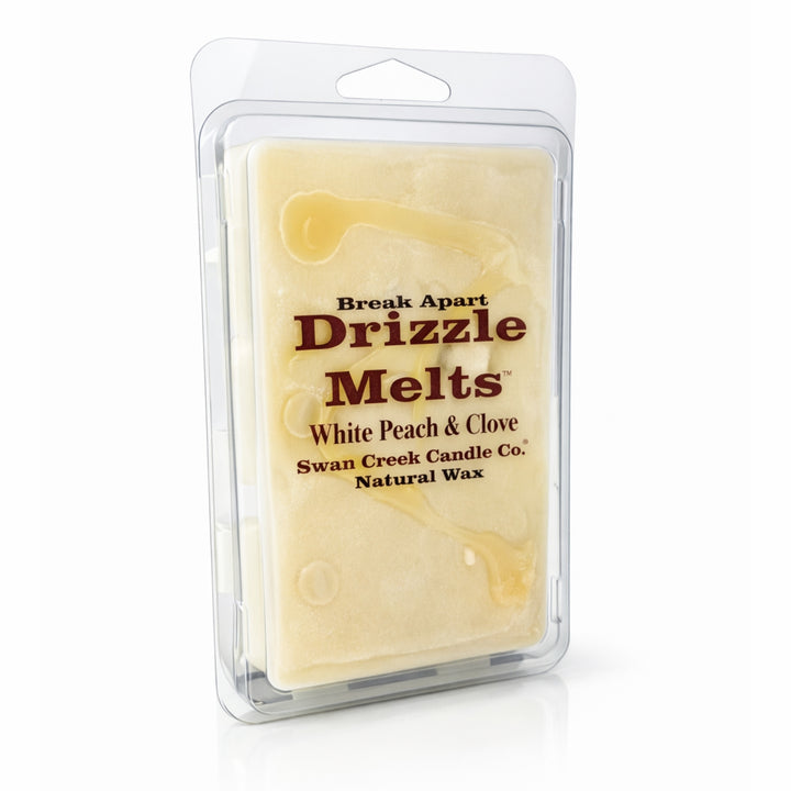Packaged wax melt with 'Drizzle Melts' branding on a white background
